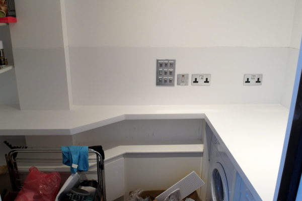 Hanex Utility worksurface splashback and custom made shelf