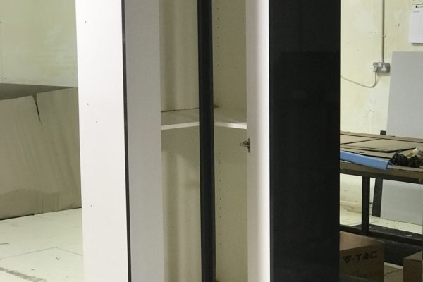 Tall bespoke corner cabinet
