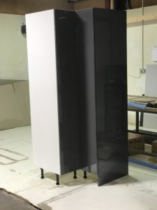 Tall bespoke corner cabinet painted grey