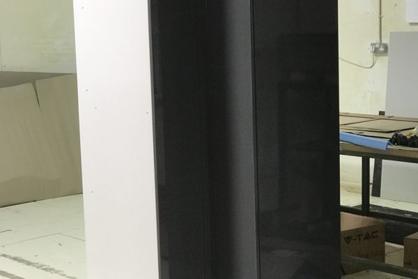 Tall bespoke corner cabinet painted grey